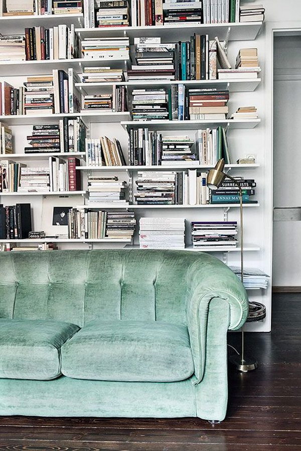 White Built Ins Behind The Sofa For Extra Storage Space. 