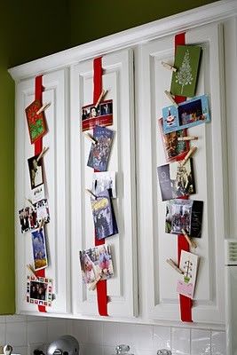 Attach Ribbon to Kitchen Cabinets and Use Clothespins to Hang Cards. 