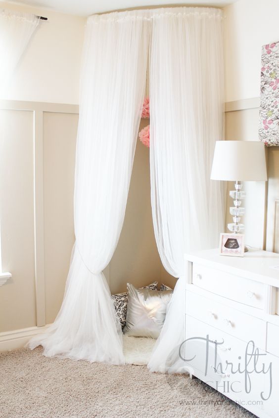 DIY Whimsical Canopy Tent or Reading Nook Made From Curved Curtain Rod And $4 Ikea Curtains. 