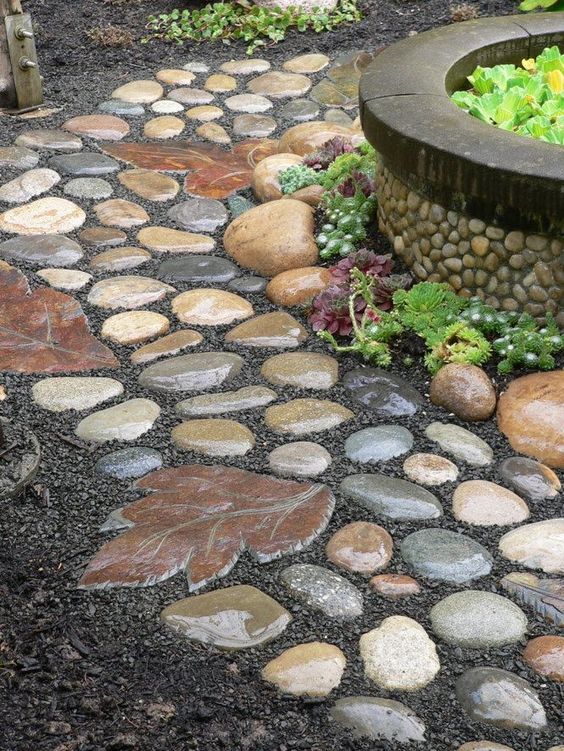 Garden Pathway Made of Rocks and the Stepping Stone Made from a Leaf Mold. 