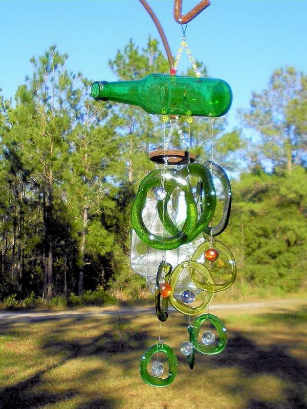 DIY Wind Chime Made of Empty Green Glass Bottles. 