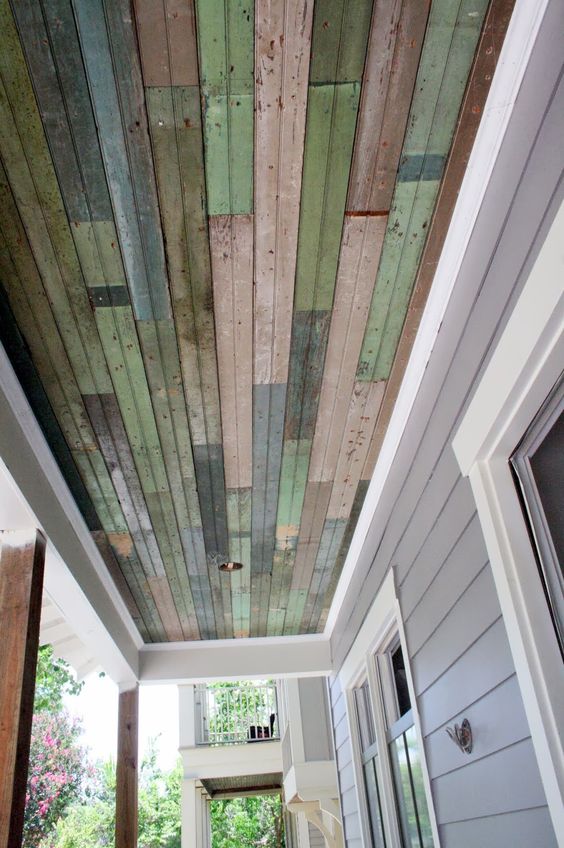 Install Salvaged Beadboard on the Porch Ceiling. 