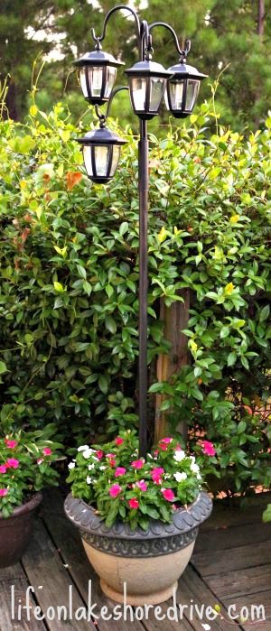 Make a Solar Light Lamp Post with Flower Planter. 