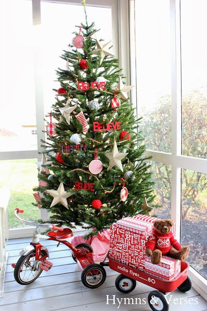 Kid's Red Wagon Filled With Packages Sit As Christmas Tree Stand. 