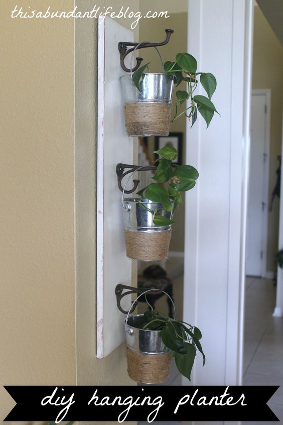 DIY Hanging Planter Using Dollar Store Buckets. 