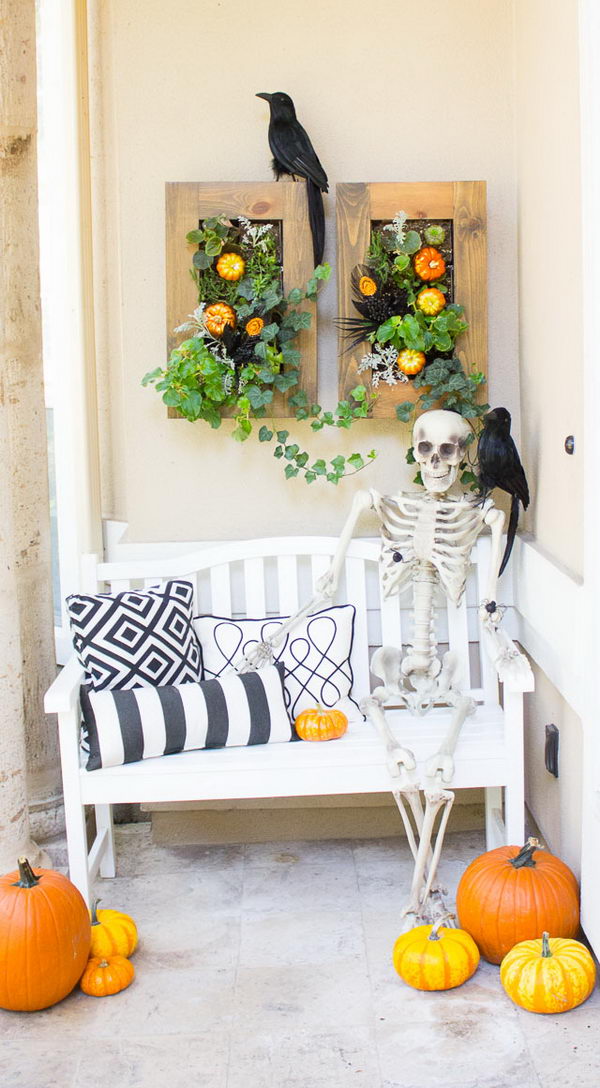 Spooky Halloween Front Porch With Raven And Skeleton. 