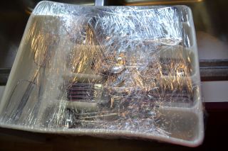 Use Plastic Wrap To Wrap Your Silverware In Its Holder For Easy To Pack And Easier To Unpack. 