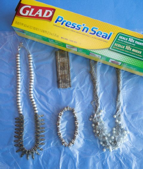 Set Your Jewelry Between Two Sheets Of Plastic Wrap To Prevent It From Moving Around And Tangling Inside Your Bag. 