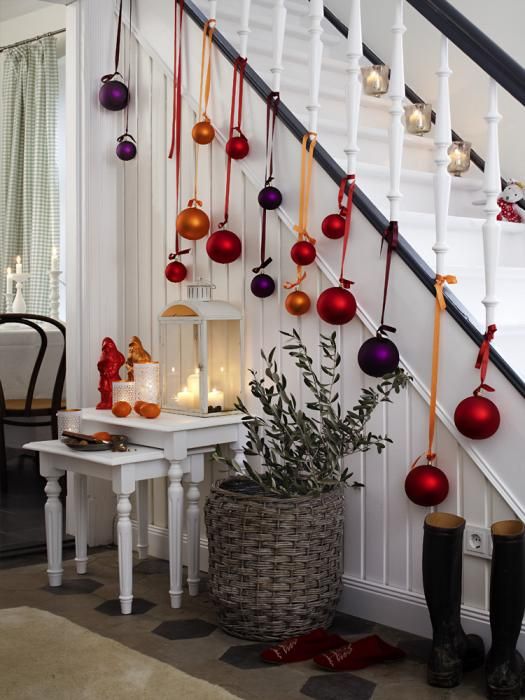 Hang Colorful Ornaments On The Stair Banister. 
