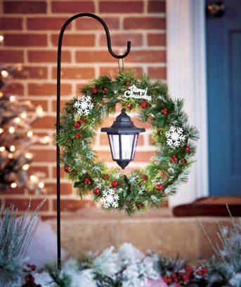 Hang A Christmas Wreath And A Solar Lantern On A Shepherd's Hook. 