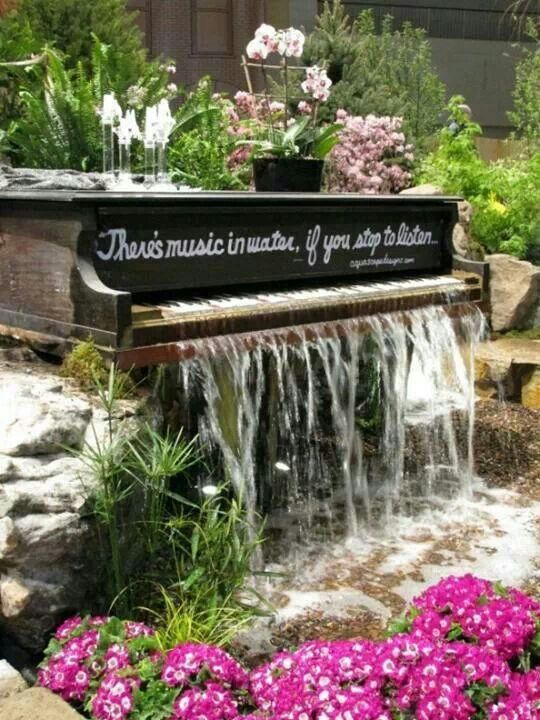 Old Piano Turned Water Feature. 